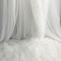 Fournisseur en gros direct usine de tissu en maille de tulle de nylon et polyester perlé or pour voiles de mariée, robes de mariée et robes de princesse