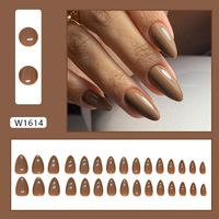 Vente en gros d'usine, ongles pressés en amande, design personnalisé de luxe, nouveaux ongles artificiels colorés populaires