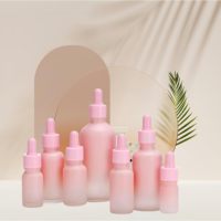 Flacon compte-gouttes rose en verre dépoli personnalisé avec impression sérigraphique pour huiles essentielles rechargeables pour diffuseur d'ambiance