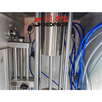 Solidpack machine de remplissage volumétrique à piston vertical semi-automatique pour bouteilles d'huile en pâte liquide avec mélangeur