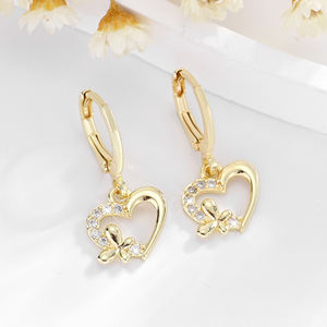 2025 alta calidad al por mayor arco corazón hueco 14K cobre chapado en oro incrustaciones de circón fiesta desgaste latón pendientes joyería de mujer - Product Image 3