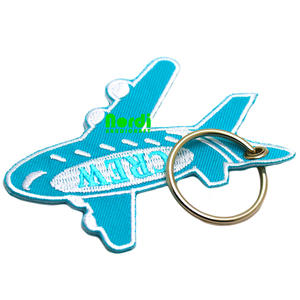 Nuevo diseño personalizado forma tejida bordada llaveros motocicleta <span class=keywords><strong>botella</strong></span> forma tejida llavero Jet Tag con llavero <span class=keywords><strong>de</strong></span> Metal - Product Image 4