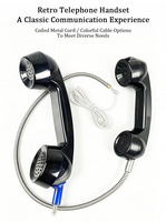 Combiné téléphonique public avec cordon métallique spiralé