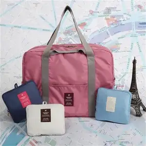 Baixo moq preço barato portátil dobrável fábrica de grande capacidade diretamente embalagem vestuário pano rosa viagem duffle bag