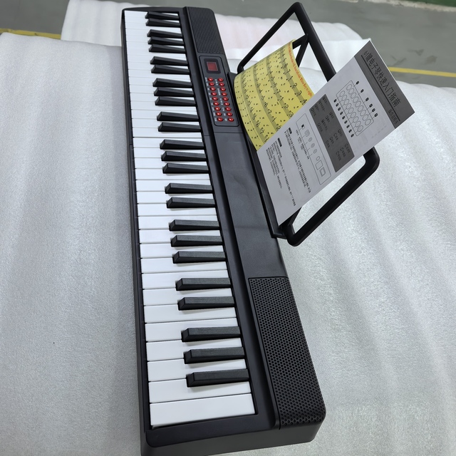 Factory Outlet 61 Key Foldable Digital Piano Portable Rechargeable Lightweight Semi Weighted Keyboard
