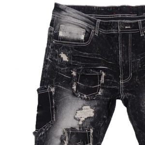 Jean en denim de haute qualité déchiré et réparé avec des patchs de poche, style Rackade Stacked pour homme - Product Image 2