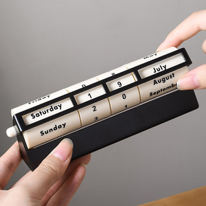Adorno de Calendario Perpetuo Giratorio Minimalista Negro al por Mayor, Ideal para Regalos de Año Nuevo y Decoración del Hogar - Product Image 1