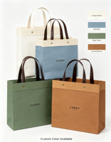 Sac fourre-tout écologique fait main et recyclable à fond carré tridimensionnel avec poignée en cuir simple, sac cadeau en papier
