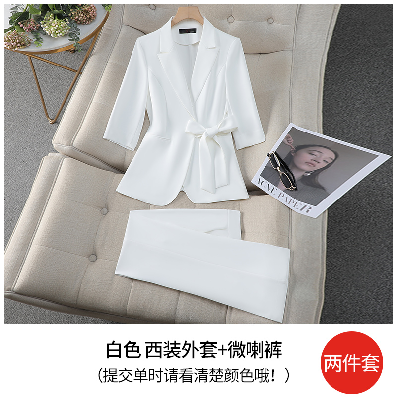 White suit jacket+slightly spicy pants