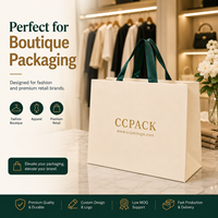 Sacs en papier personnalisés avec poignée en ruban et logo estampé à chaud en or, fabriqués en papier couché pour l'emballage cadeau de boutiques, vente en gros