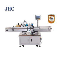 Machine de remplissage de liquides entièrement automatique pour petits volumes, machine de bouchage, machine d'étiquetage, bouteilles, canettes, verre, métal, film, haute précision
