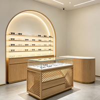 Vitrines d'exposition LED personnalisées pour lunettes, comptoirs de magasin d'optique, stations d'expérience en îlot central de centre commercial et vitrines d'exposition
