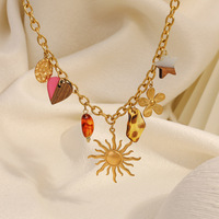 SUMMLY Collier à breloques en acier inoxydable plaqué or 18 carats, étanche et anti-ternissement, motif tournesol en résine de bois, bijoux bohèmes pour femme