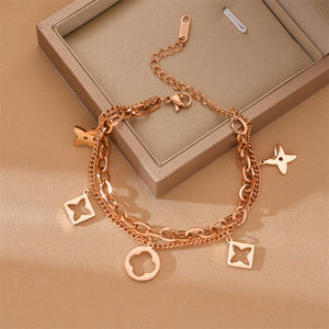 Pulseras de acero inoxidable de cuatro hojas ahuecadas para mujer, doble capa, cadena de tobillo sin decoloración, joyería popular europea - Product Image 3