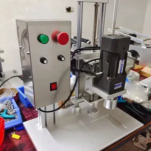 Machine de capsulage