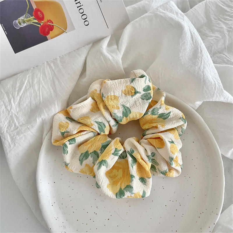 1 yellow floral hair tie