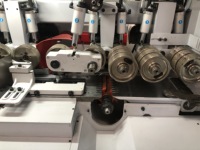 Machine à bois HOLZH pour le travail du bois massif et du MDF, 6 têtes de fraisage, 4 faces à planer