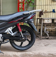 Vélo à cadre courbé Haojue Xuandi 110cc en gros, moteur 110cc, vitesse maximale 61-80 km/h, transmission fluide, design ergonomique