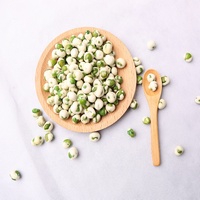 Pois verts enduits rôtis avec de la poudre de wasabi Snack de loisirs