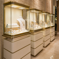 Vitrine à bijoux autoportante moderne en verre, éclairage LED multicouche, écologique, étanche, robuste, pour le commerce de détail
