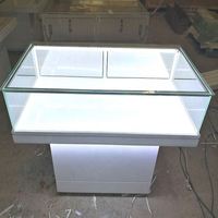 Vitrine à bijoux commerciale moderne, tiroirs multi-niveaux, construction en MDF et verre, éclairage LED, logo personnalisable, taille et couleur au choix