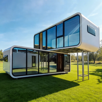 Capsule spatiale futuriste de 40 pieds, démontable, en forme de conteneur – Maison respirante, mobile, au design moderne pour parcs extérieurs, boutiques et appartements