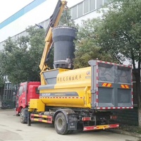 Nouveau design de camion à ordures compacteur FAW 12m3 avec seau de levage de grue