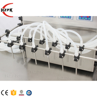 Machine de remplissage d'eau semi-automatique HZPK à 12 buses avec pompe à diaphragme pour bouteilles 2L