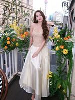 Robe de soirée longue évasée Nicecover, col halter, ornée de perles et de strass brillants, couleur champagne, idéale pour les banquets et mariages – Nouvelle collection très prisée