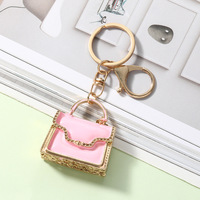 Pendentif de sac en métal de style raffiné européen et américain, accessoires de luxe légers pour voiture et porte-clés, vente en gros