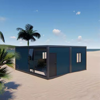 Maison de plage modulaire préfabriquée de luxe en acier avec façade vitrée, vue sur l'océan, assemblage rapide, cabane portable
