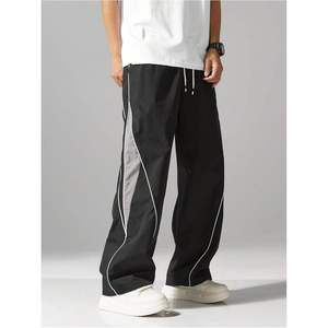 <span class=keywords><strong>Pantalon</strong></span> de <span class=keywords><strong>jogging</strong></span> en nylon léger et personnalisable pour homme, coupe droite, style urbain, avec grandes poches, idéal pour le sport et le travail - Product Image 1