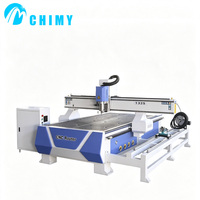 Machine de gravure CNC 4 axes à table sous vide 1325 pour le traitement du bois massif, avec gravure à plat et rotative