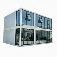 Maison conteneur préfabriquée modulaire en acier de 20 pieds avec mur rideau en verre pour bureau, studio, jardin, extérieur