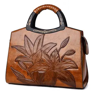JIANUO 뜨거운 판매 여성 고품질 가죽 핸드백 가장 인기있는 양각 핸드백