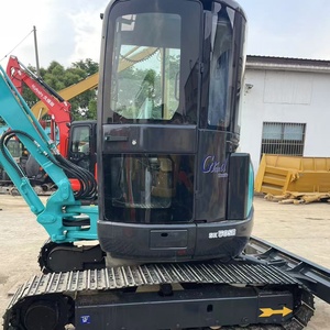 รถขุดขนาดเล็ก KOBELCO SK50SR ห้องโดยสารสีดำ แขนสีเขียวอมฟ้า อุปกรณ์ก่อสร้างมือสอง - Product Image 1