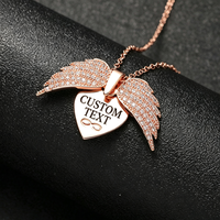 Nouveau collier hip-hop en chaîne de bambou, entièrement incrusté de diamants, avec logo gravé et design d'aile ouvrante en forme d'aileron d'ange