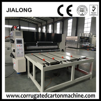 Machine d'impression flexographique à alimentation par chaîne à 4 couleurs avec rainureuse et découpeuse