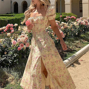 Nouvelle Robe d'été 2026 à la mode, imprimée, style français, motif floral, dos nu, ajustée, col licou, fendue, vente en gros, best-seller - Product Image 1