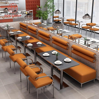 Ensemble de meubles modernes pour restaurant Cabine de canapé en cuir orange avec structure en métal et dessus de table commercial en marbre foncé pour café