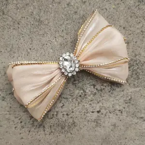 Nodo dell'arco dal design grazioso con diamante lucido di alta qualità per accessori decorativi per ornamenti per capelli