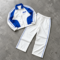 Ensemble de survêtement rétro coupé-cousu, color block blanc et bleu roi, double bande, fabrication OEM/ODM, vente en gros en vrac