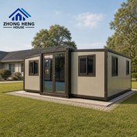 Maison modulaire préfabriquée extensible pour villas, jardins et projets résidentiels avec entrée centrale – Maison conteneur