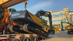 Excavatrice sur chenilles Hyundai 305LC 9T jaune, hydraulique, pour travaux de construction, machine lourde sur chenilles - Product Image 3