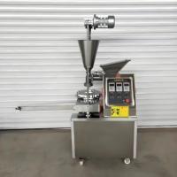 Machine automatique à baozi pour le remplissage et le façonnage de petits pains farcis à la vapeur