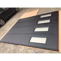 Porte de garage sectionnelle à panneaux surélevés en acier galvanisé au design moderne, surface finie, âme en mousse, pour villa résidentielle