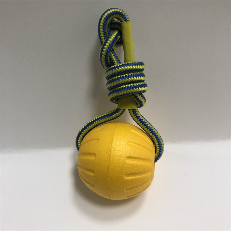 Balle 7CM avec corde ronde jaune