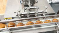 Machine d'injection de crème feuilletée Eclair à haute efficacité Machine de remplissage de crème Machine de remplissage latérale de Croissant de gâteau