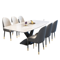 Ensemble de salle à manger extensible de luxe moderne avec 8 chaises, structure en métal et plateau en marbre pour usage hôtelier