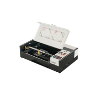 Mini CO2-Laser-Gravur- und Schneidemaschine für den Heimgebrauch, 40W/50W, 2030 A4-Format, Wabenbett, Wassergekühlt, Hochpräzise für Holz/MDF